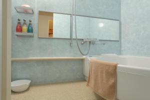 Koupelna v ubytování Town Hotel 41
