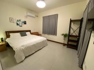 Llit o llits en una habitació de 18 Walking Homestay