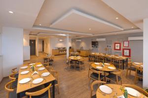 Restaurant ou autre lieu de restauration dans l'établissement Hotel GT at Delhi Airport