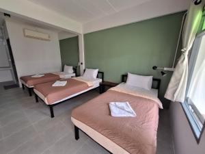 Postel nebo postele na pokoji v ubytování Sleep Pai Bed & Breakfast