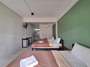 Postel nebo postele na pokoji v ubytování Sleep Pai Bed & Breakfast