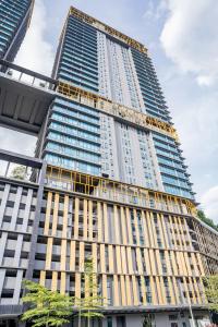 a tall building is being constructed at EUcation Home - Opus Residence in Kuala Lumpur