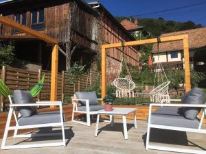 Patio alebo iná vonkajšia časť ubytovania Au Relais de l'Histoire Gîte classé 4 étoiles