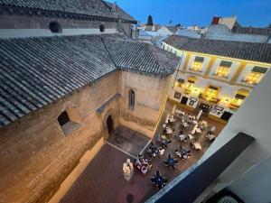 an overhead view of a group of tables in a building at Apartamento céntrico San Miguel in Córdoba