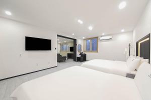 Μια τηλεόραση ή/και κέντρο ψυχαγωγίας στο Busan Seomyeon Broa Hotel