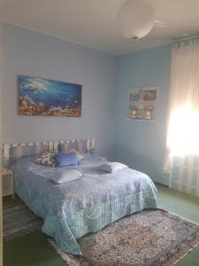 Postel nebo postele na pokoji v ubytování Dacia di Bergamo