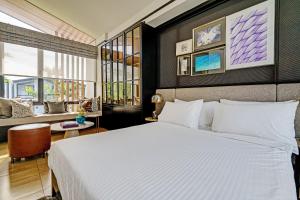 Кровать или кровати в номере OYO Life 92719 Rolling Hills Residence Karawang