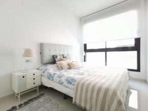 Posteľ alebo postele v izbe v ubytovaní Luxury Apartment Torrevieja + 20 fotografií
