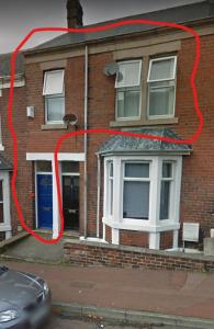 a house with a red circle around a window at Faraday - Central location Ideal for contractors and visiting Newcastle Free Wifi Free Parking in Gateshead