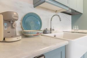Η κουζίνα ή μικρή κουζίνα στο Cathedral Keepers - Exclusive apartment in Jerez +42 φωτογραφίες