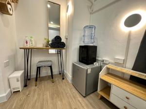 Kuchyň nebo kuchyňský kout v ubytování The White Den Sukhumvit 44