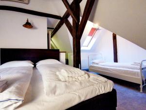 Postel nebo postele na pokoji v ubytování FRIEDRICH HOMM