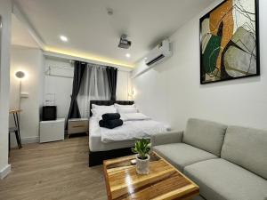 Posezení v ubytování The White Den Sukhumvit 44