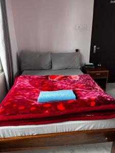 Postel nebo postele na pokoji v ubytování Pratha Homestay