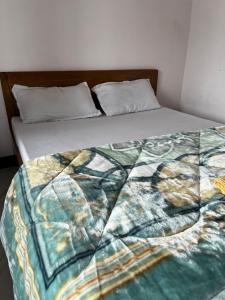 Postel nebo postele na pokoji v ubytování Pratha Homestay