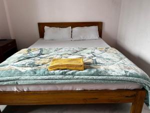 Postel nebo postele na pokoji v ubytování Pratha Homestay