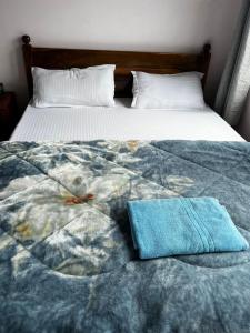 Postel nebo postele na pokoji v ubytování Pratha Homestay