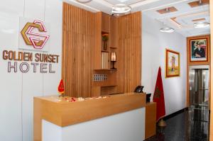 a lobby of a golden sunset hotel with a reception desk at Hotel Golden Sunset Dakhla in Dakhla