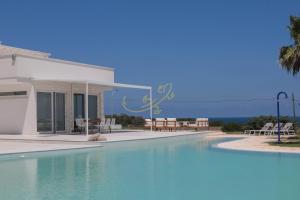 Πισίνα στο ή κοντά στο TD Villa Maestrale Luxury Pool & Sea View