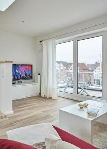 Et tv og/eller underholdning på City Marina - Haus 24a