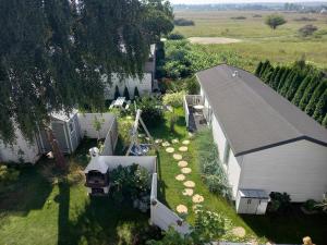 an overhead view of a backyard with a house and a garden at Willa Bloom in Rewa