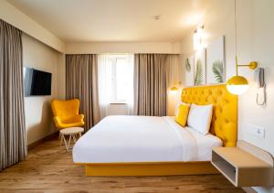 Bloom Hotel - Jammu客房内的一张或多张床位