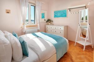 Postel nebo postele na pokoji v ubytování Sun Spalato Hills 8