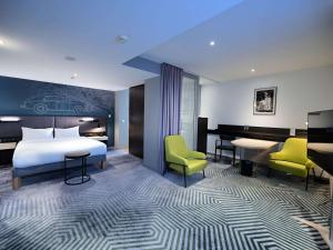 Posteľ alebo postele v izbe v ubytovaní Mercure Warszawa Grand