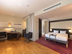 Posteľ alebo postele v izbe v ubytovaní Mercure Warszawa Grand