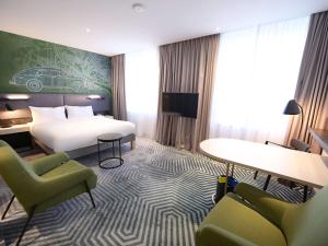 Posteľ alebo postele v izbe v ubytovaní Mercure Warszawa Grand