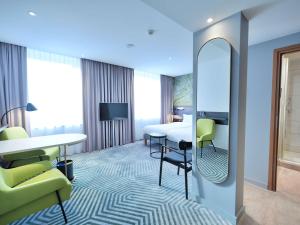 Posedenie v ubytovaní Mercure Warszawa Grand