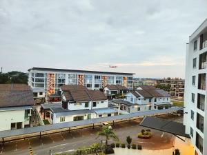 an overhead view of a city with buildings at Gem Suites Minimalist 2BR 4beds Entire Apartment in Kuching