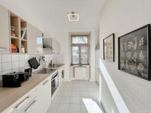 Kuchyň nebo kuchyňský kout v ubytování Weimar 3-Raum Appartement