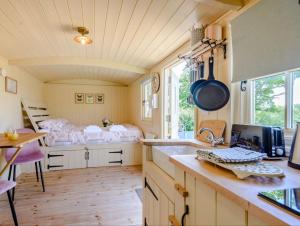 a kitchen with a sink and a stove at Hot Tub Retreat - Hartley Wine Estate 