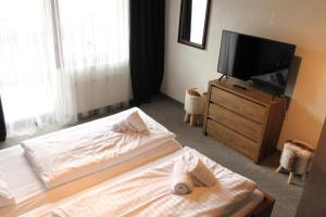Postel nebo postele na pokoji v ubytování Draxlerhaus