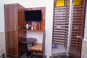 TV a/nebo společenská místnost v ubytování Golden Residency