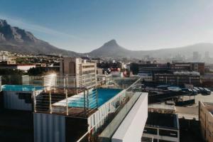 a building with a swimming pool on top of it at The Heaven on Earth Hosted By Jose & Teresa in Cape Town