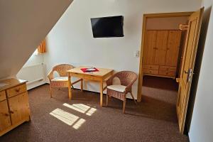 Posedenie v ubytovaní Horský Hotel Sněženka