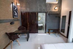 Postel nebo postele na pokoji v ubytování Na Klongluang Boutique Resort