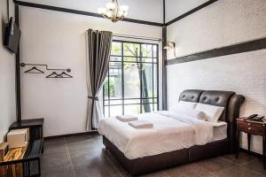 Postel nebo postele na pokoji v ubytování Na Klongluang Boutique Resort