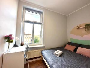 Postel nebo postele na pokoji v ubytování MMRent Sunset Room