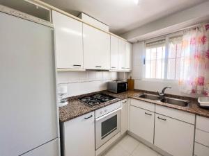 Kuchyň nebo kuchyňský kout v ubytování Espacio ideal en la Playa