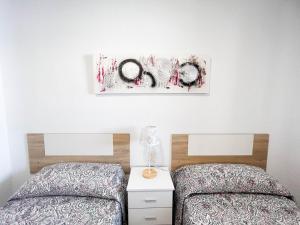 Postel nebo postele na pokoji v ubytování Espacio ideal en la Playa
