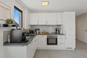 Küche/Küchenzeile in der Unterkunft SEEview Maisonette in direkter Seenähe