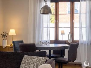 Posezení v ubytování Rustic Villa in Central Piteå + 15 fotografií