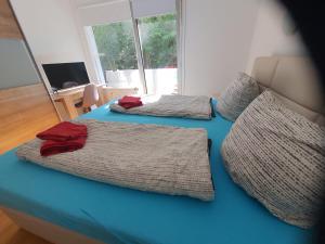 Postelja oz. postelje v sobi nastanitve Happy Home - inclusive Pool & Sauna
