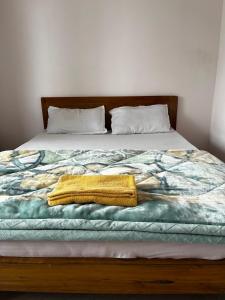 Postel nebo postele na pokoji v ubytování Pratha Homestay