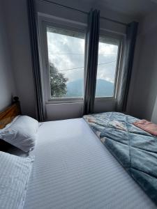 Postel nebo postele na pokoji v ubytování Pratha Homestay + 36 fotografií