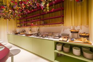 a kitchen with a counter with food on it at Kazakiwi in Luxembourg