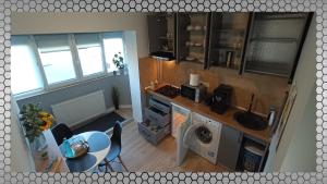 Кухня или мини-кухня в Vi’studio
